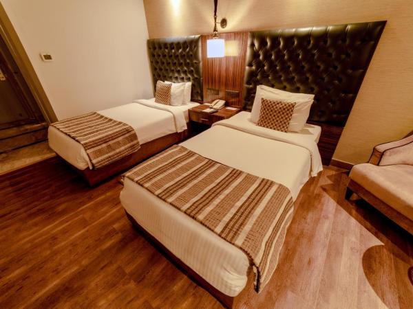 Sarovar Portico Jaipur : photo 1 de la chambre premium room with twin bed and 2 pints of beer and 20% discount on fnb
