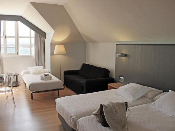 Hotel Chiqui : photo 2 de la chambre chambre lits jumeaux avec lit d’appoint - 301