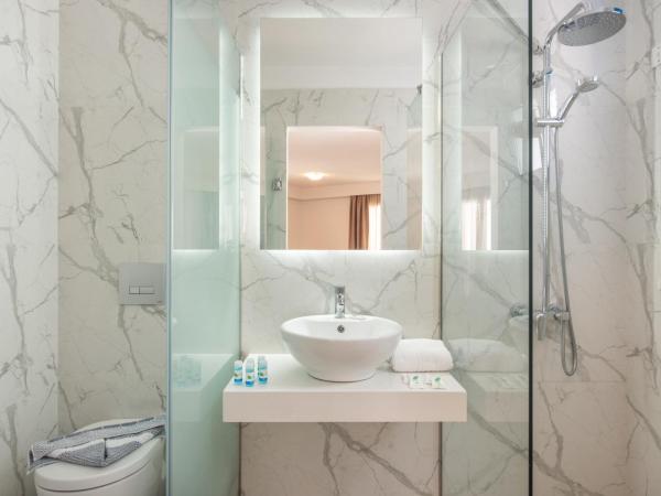 Sunshine Village Hotel : photo 4 de la chambre suite junior - vue sur jardin