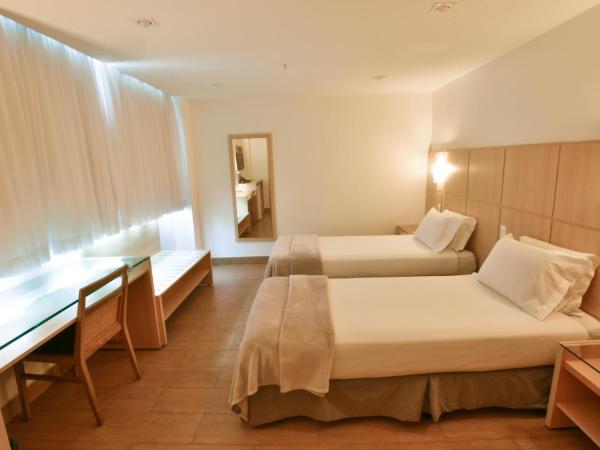 Atlantico Sul Hotel : photo 1 de la chambre chambre lits jumeaux pour personnes à mobilité réduite
