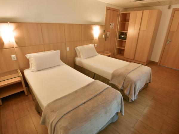 Atlantico Sul Hotel : photo 3 de la chambre chambre lits jumeaux pour personnes à mobilité réduite