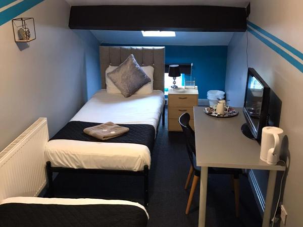 Queens Guesthouse Manchester : photo 1 de la chambre chambre lits jumeaux Économique