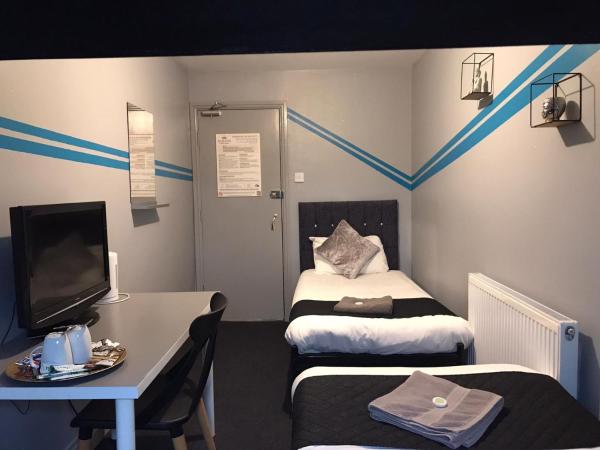 Queens Guesthouse Manchester : photo 2 de la chambre chambre lits jumeaux Économique