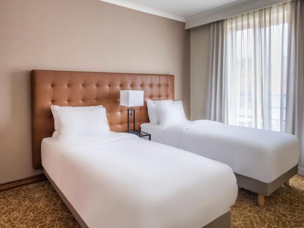 Marriott Executive Apartments Brussels : photo 2 de la chambre suite 1 chambre avec 2 lits jumeaux/simples et canapé-lit