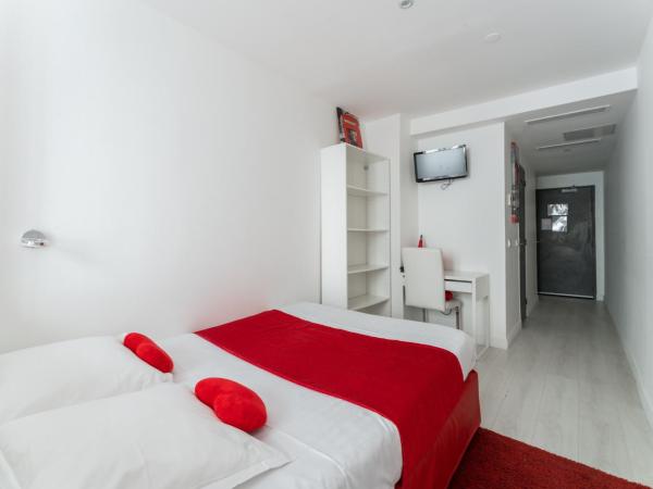 L'Oasis Montparnasse : photo 9 de la chambre chambre triple