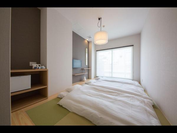 Hotel Plus Hostel SAPPORO : photo 3 de la chambre chambre de style japonais avec salle de bains privative