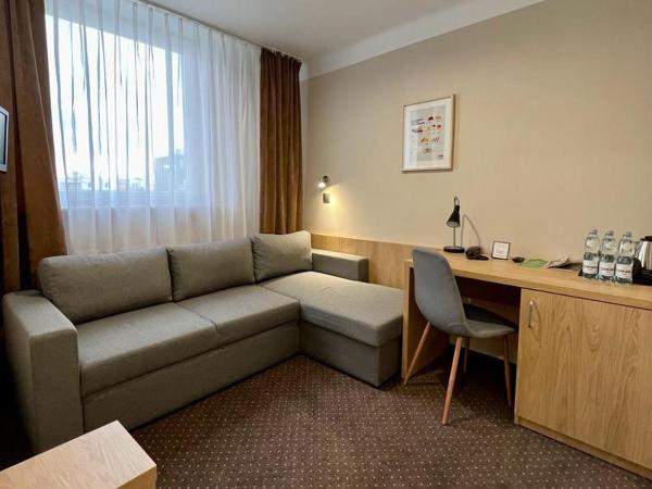 Hotel Boss : photo 3 de la chambre economy twin room with sofa bed