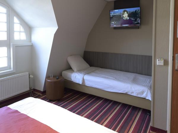 Mozart Hotel : photo 2 de la chambre chambre triple - vue sur canal