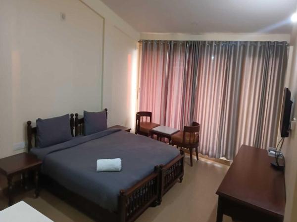 Baywatch Beach Homes : photo 5 de la chambre chambre double deluxe - vue latérale sur mer