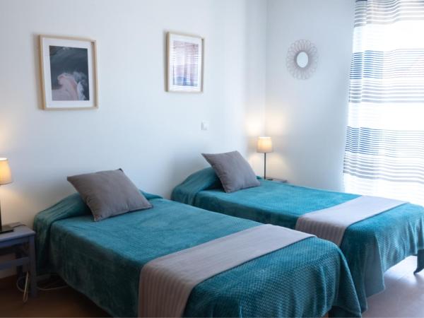 PKSC Surf House : photo 2 de la chambre chambre lits jumeaux - vue sur mer