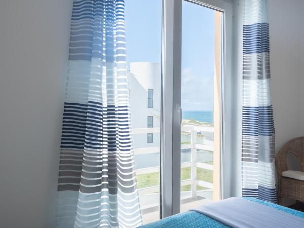 PKSC Surf House : photo 3 de la chambre chambre lits jumeaux - vue sur mer