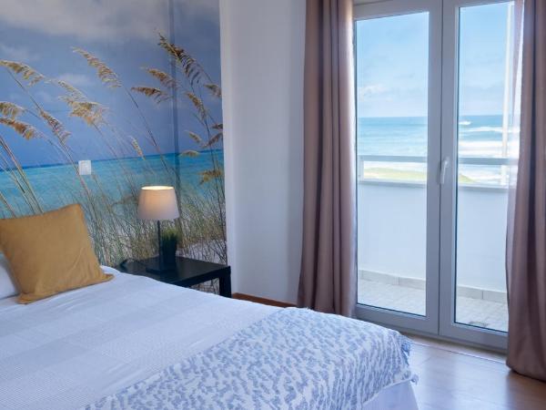 PKSC Surf House : photo 9 de la chambre chambre double deluxe avec balcon - vue sur mer