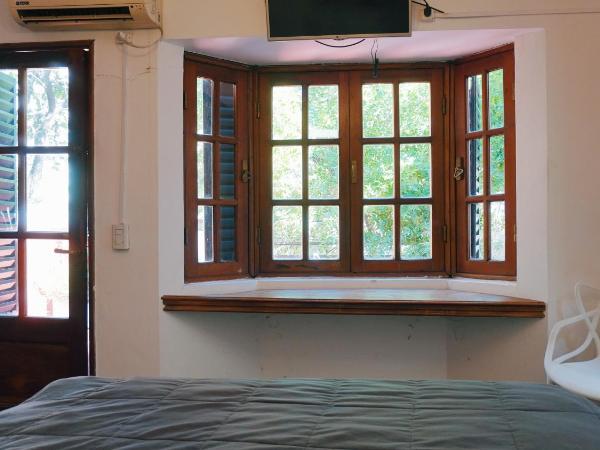 Hostel Posada Juan Ignacio : photo 4 de la chambre suite lit queen-size avec salle de bains privative