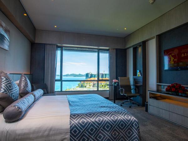 The Pacific Sutera : photo 5 de la chambre hébergement lit king-size de luxe - vue sur mer