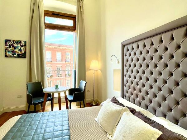 Antico Corso Charme : photo 2 de la chambre chambre double ou lits jumeaux deluxe - vue sur ville 