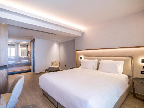 AKASHA Beach Hotel & Spa : photo 3 de la chambre hébergement chic urbain avec bain à remous extérieur - vue sur ville