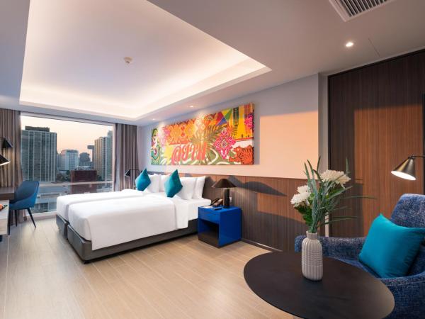 Maitria Hotel Rama 9 Bangkok - A Chatrium Collection : photo 5 de la chambre grand deluxe garden view twin room