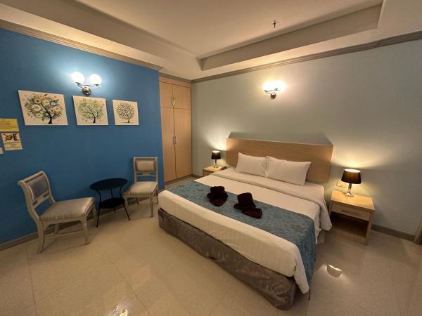 Thipurai City Hotel : photo 3 de la chambre chambre double deluxe avec baignoire