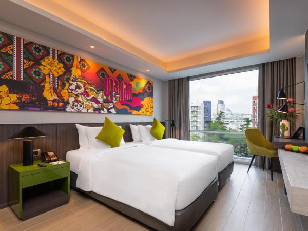 Maitria Hotel Rama 9 Bangkok - A Chatrium Collection : photo 8 de la chambre chambre lits jumeaux supérieure – vue sur jardin