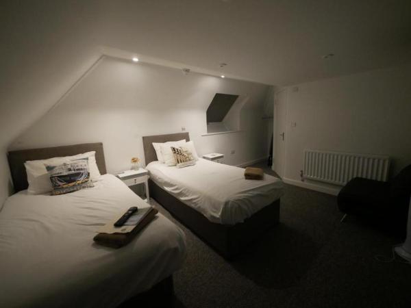 The Gather Inn : photo 4 de la chambre chambre triple avec douche