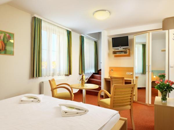 Penzion Krumlov - B&B - Massage studio : photo 1 de la chambre chambre quadruple - duplex