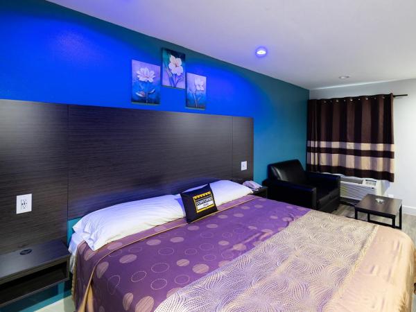 Downtowner Inns - Houston Downtown & Convention Center : photo 3 de la chambre chambre lit king-size