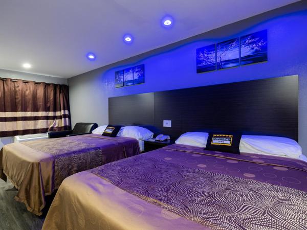 Downtowner Inns - Houston Downtown & Convention Center : photo 4 de la chambre chambre lit queen-size