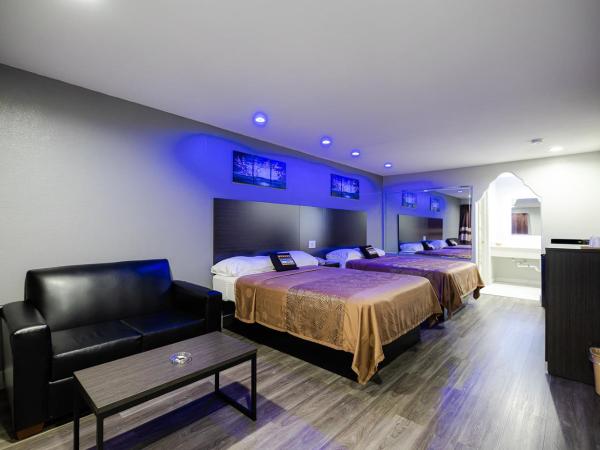 Downtowner Inns - Houston Downtown & Convention Center : photo 6 de la chambre chambre lit queen-size