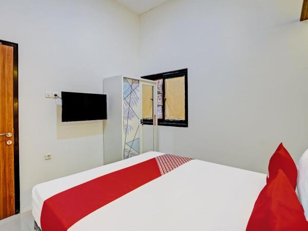OYO 92435 Sunlo Cozy Home Family Homestay Syariah : photo 4 de la chambre suite supérieure