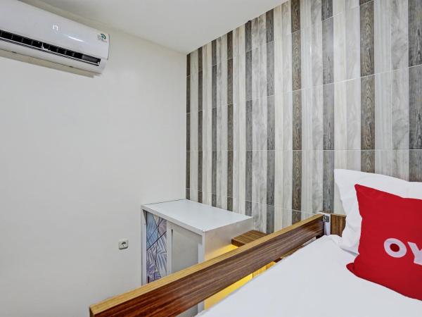 OYO 92435 Sunlo Cozy Home Family Homestay Syariah : photo 2 de la chambre chambre lits jumeaux Économique