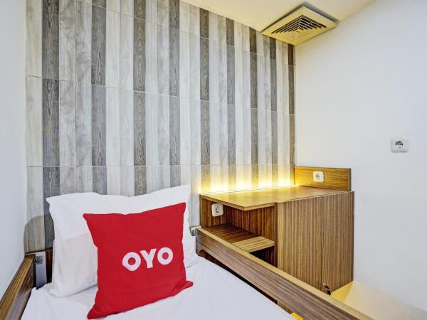 OYO 92435 Sunlo Cozy Home Family Homestay Syariah : photo 3 de la chambre chambre lits jumeaux supérieure