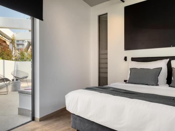 Koniama Acropolis : photo 10 de la chambre suite acropole avec bain à remous