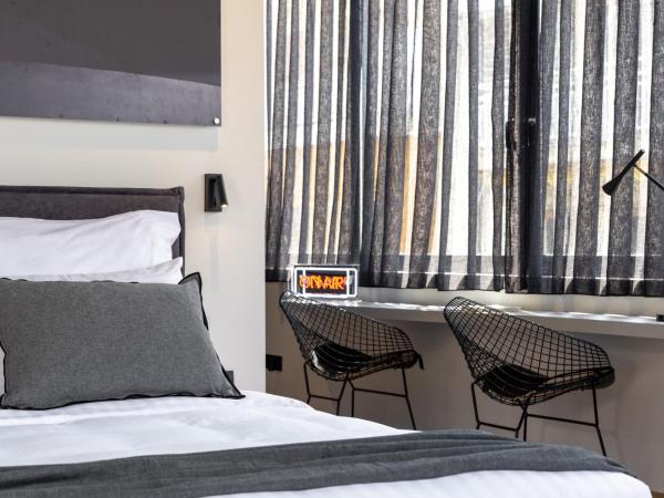 Koniama Acropolis : photo 9 de la chambre suite acropole avec bain à remous