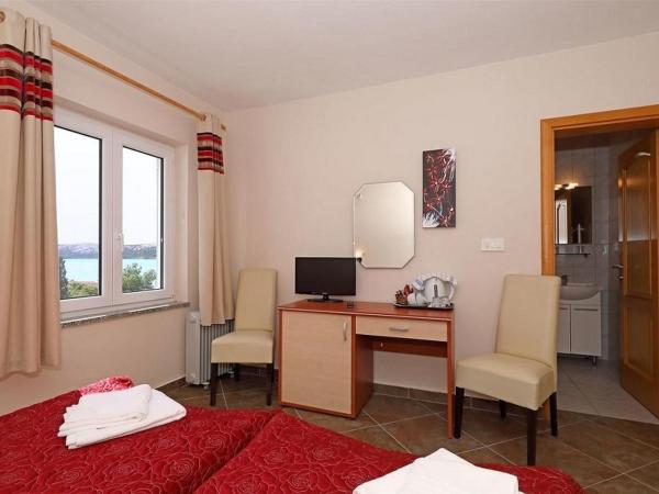 Apartments and rooms by the sea Stara Novalja, Pag - 6303 : photo 2 de la chambre chambre lits jumeaux