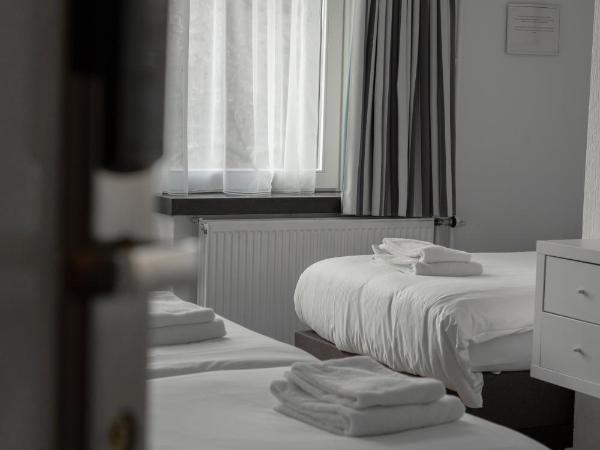 Hotel de la Bourse : photo 1 de la chambre chambre triple