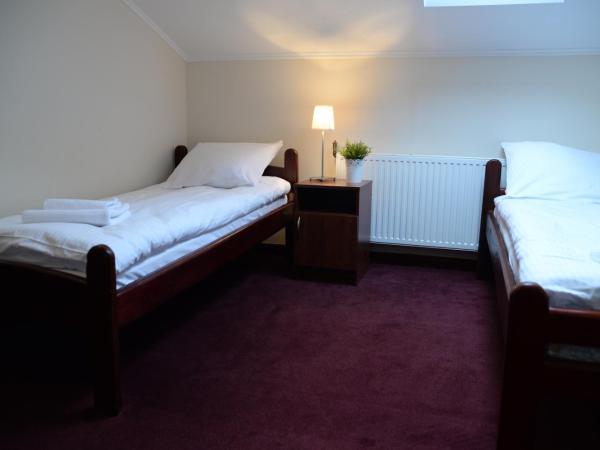 Zajazd Pod Gwiazdami : photo 2 de la chambre chambre lits jumeaux