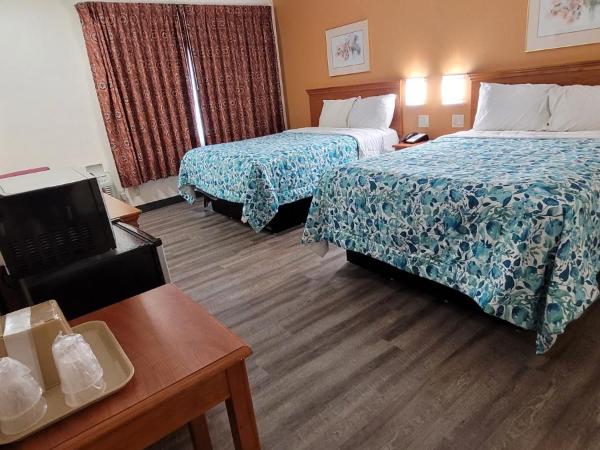 Harvey's Motel SDSU La Mesa San Diego : photo 6 de la chambre chambre avec 2 grands lits queen-size