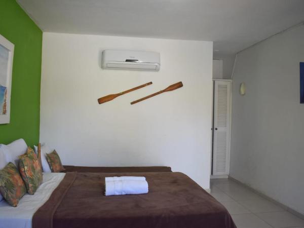 Hibiscus Center : photo 1 de la chambre chambre quadruple