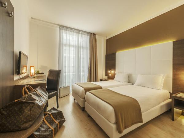 Ambassador-Monaco : photo 3 de la chambre chambre lits jumeaux