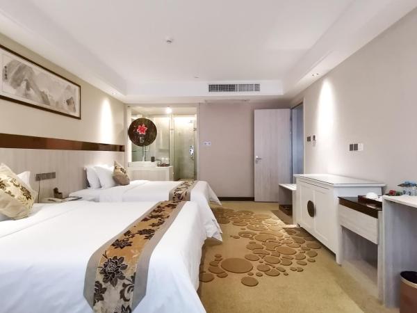 Paco Hotel Tianhe Coach Terminal Metro Guangzhou : photo 10 de la chambre suite exécutive