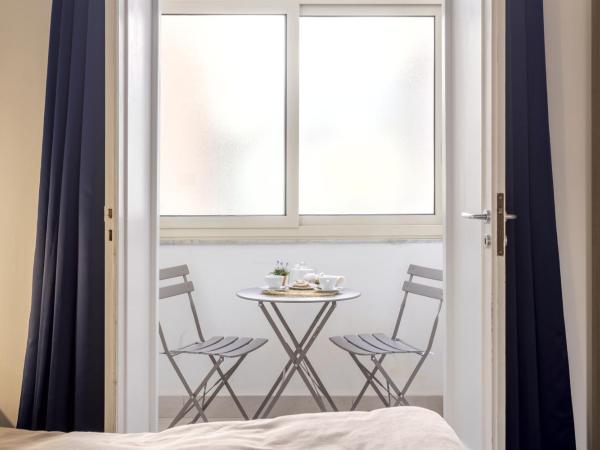 B&B Massimocentro : photo 3 de la chambre chambre double ou lits jumeaux avec salle de bains privative externe