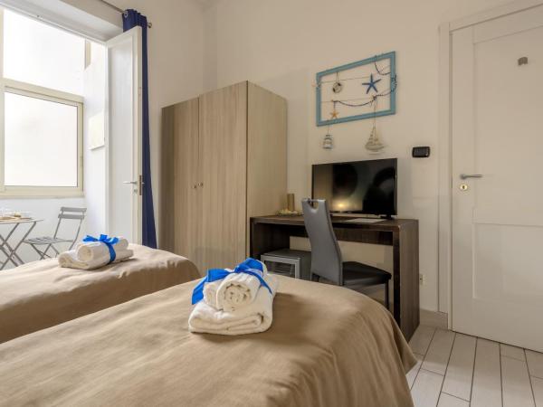 B&B Massimocentro : photo 4 de la chambre chambre double ou lits jumeaux avec salle de bains privative externe