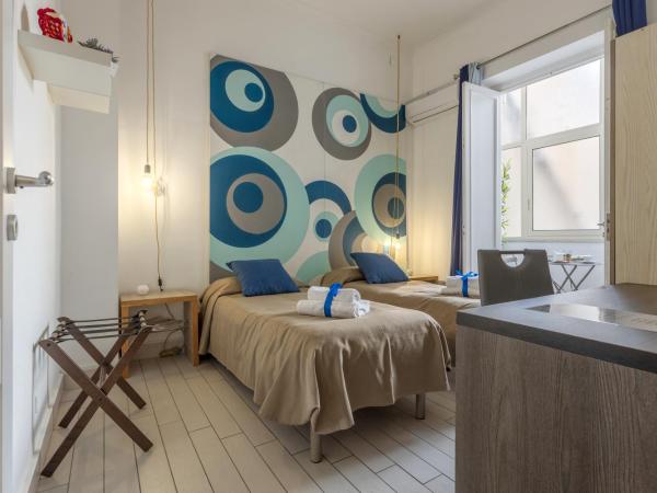 B&B Massimocentro : photo 1 de la chambre chambre double ou lits jumeaux avec salle de bains privative externe