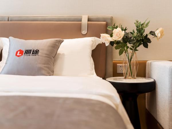 Livetour Hotel Financial City Keyun Road Metro Guangzhou : photo 6 de la chambre chambre lit king-size lizzy (avec lave-linge séchant et télévision)