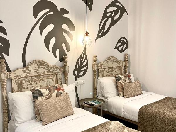 Hostal El Caprichito Marbella : photo 4 de la chambre chambre lits jumeaux