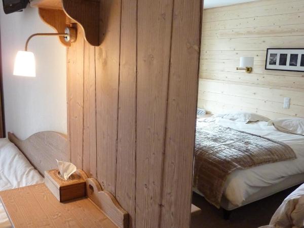 Le Roitelet : photo 10 de la chambre chambre quadruple supérieure avec balcon