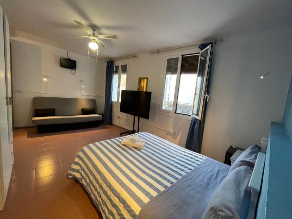 P&R hostals Can Tort : photo 3 de la chambre chambre quadruple confort