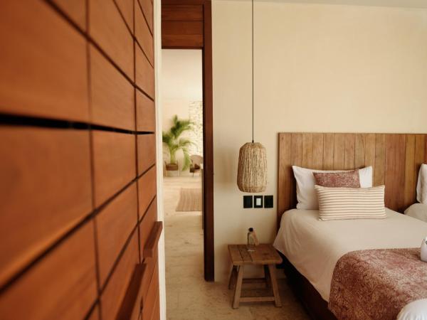 Copal Tulum Hotel : photo 10 de la chambre chambre double deluxe jungle avec terrasse et 1 lit king-size