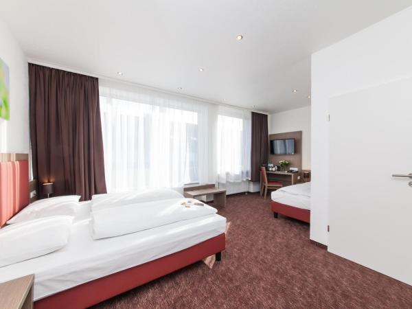 Hotel Excelsior Dortmund Hauptbahnhof : photo 5 de la chambre chambre triple standard