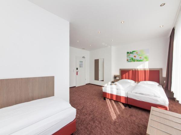 Hotel Excelsior Dortmund Hauptbahnhof : photo 4 de la chambre chambre triple standard